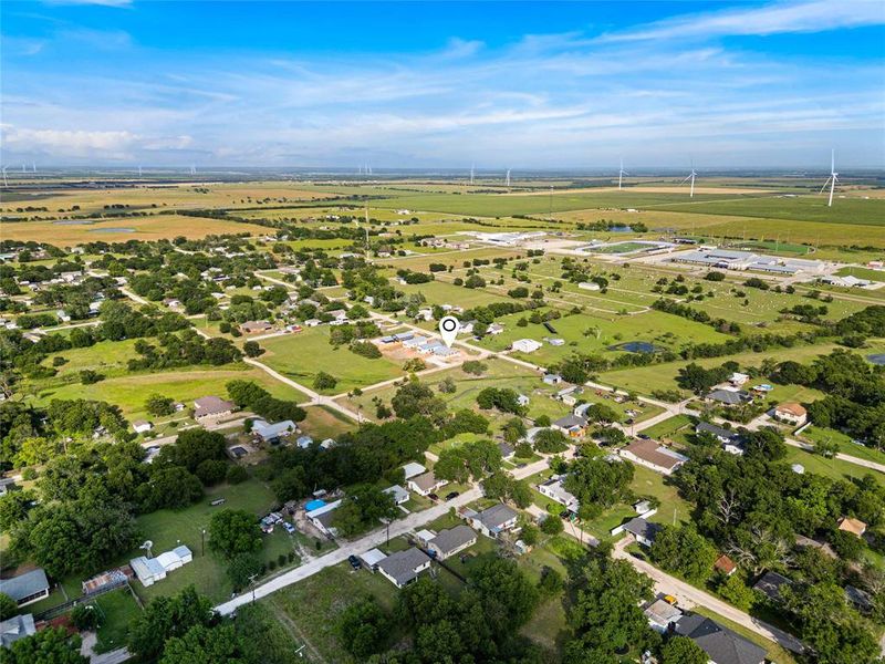 Aerial view of property and surrounding area with rural landscape