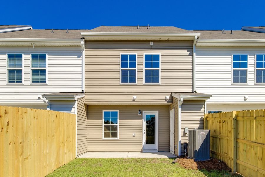 Front exterior of a new home in Astoria, Columbia, SC, highlighting curb appeal (Image 20).