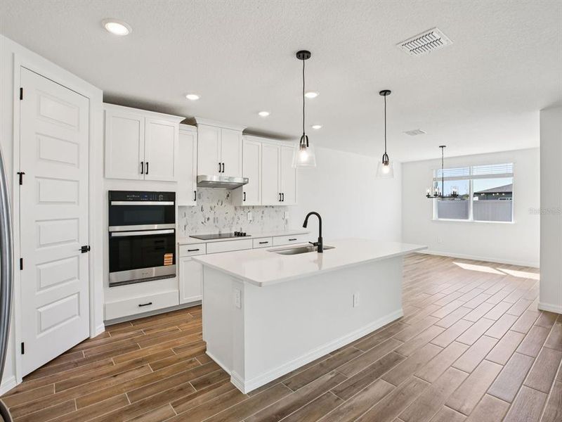 Furnished interior view inside a new home in Two Rivers - Signature Series, Zephyrhills (Image 9). Furnished interior view inside a new home in Two Rivers - Signature Series, Zephyrhills (Image 9).