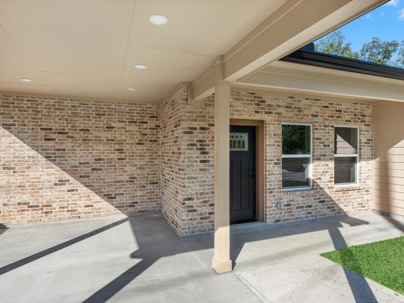 Exterior details and patio area of a home in , Houston (Image 21). Exterior details and patio area of a home in , Houston (Image 21).
