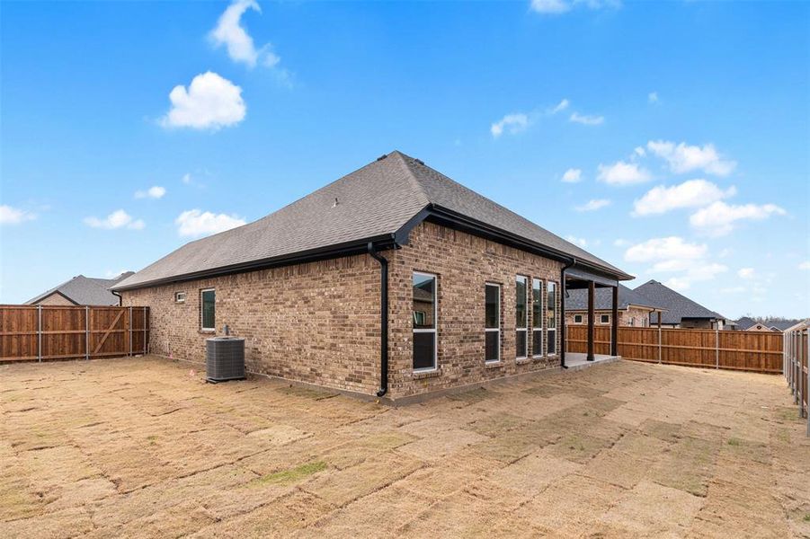 Exterior details and patio area of a home in , Mabank (Image 3).