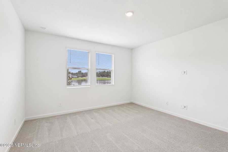 Spacious, unfurnished interior of a new home in Lakes at Bella Lago - Signature Series, Green Cove Springs (Image 26).