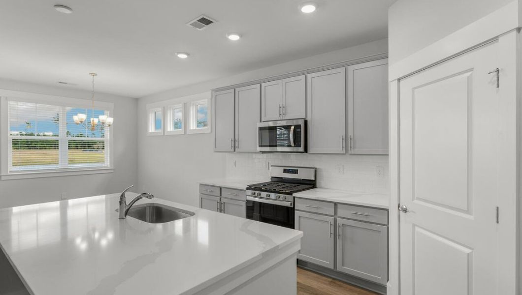 Representative furnished interior of a home built from the MADISON by D.R. Horton in The Grove at Blake Farm, Wilmington (Image 8). Representative furnished interior of a home built from the MADISON by D.R. Horton in The Grove at Blake Farm, Wilmington (Image 8).