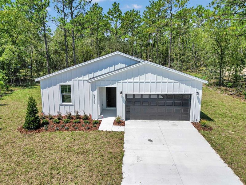 Front exterior of a new home in , Dunnellon, FL, highlighting curb appeal (Image 20). Front exterior of a new home in , Dunnellon, FL, highlighting curb appeal (Image 20).