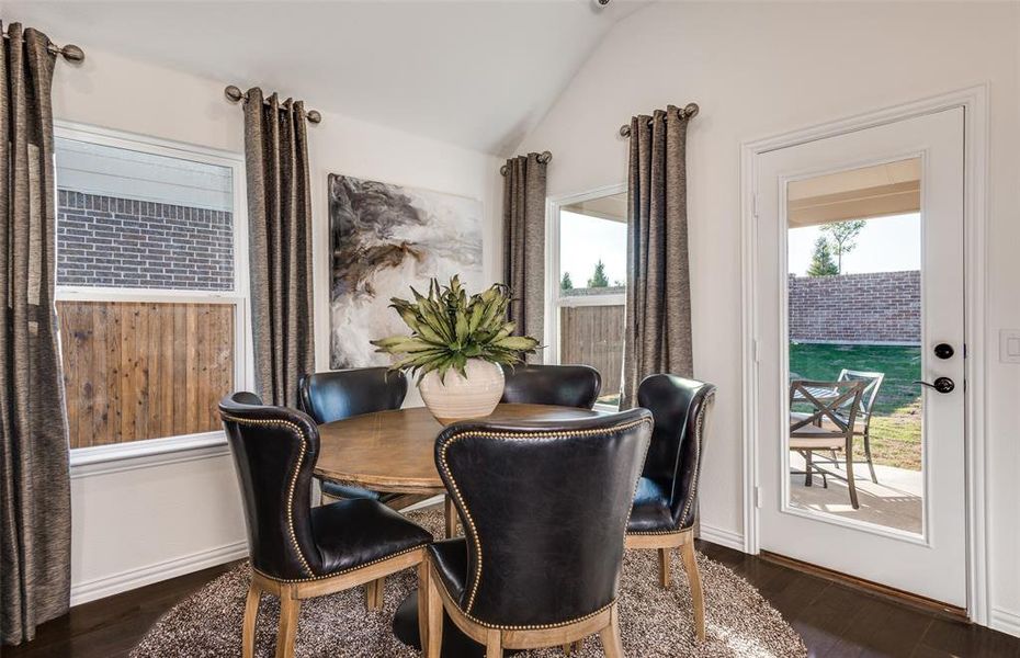 *Model Representation - Dining nook off kitchen with large windows