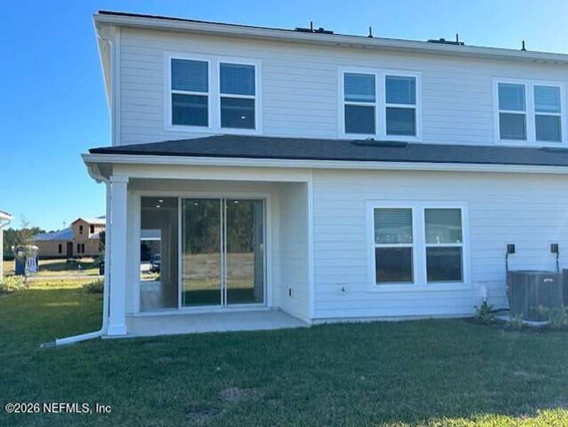 Exterior details and patio area of a home in Brook Forest, St. Augustine (Image 3).