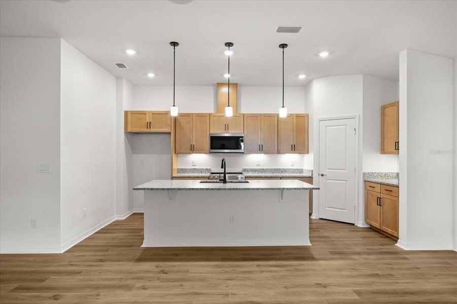 Furnished interior view inside a new home in Hickory Ranch, Auburndale (Image 5).