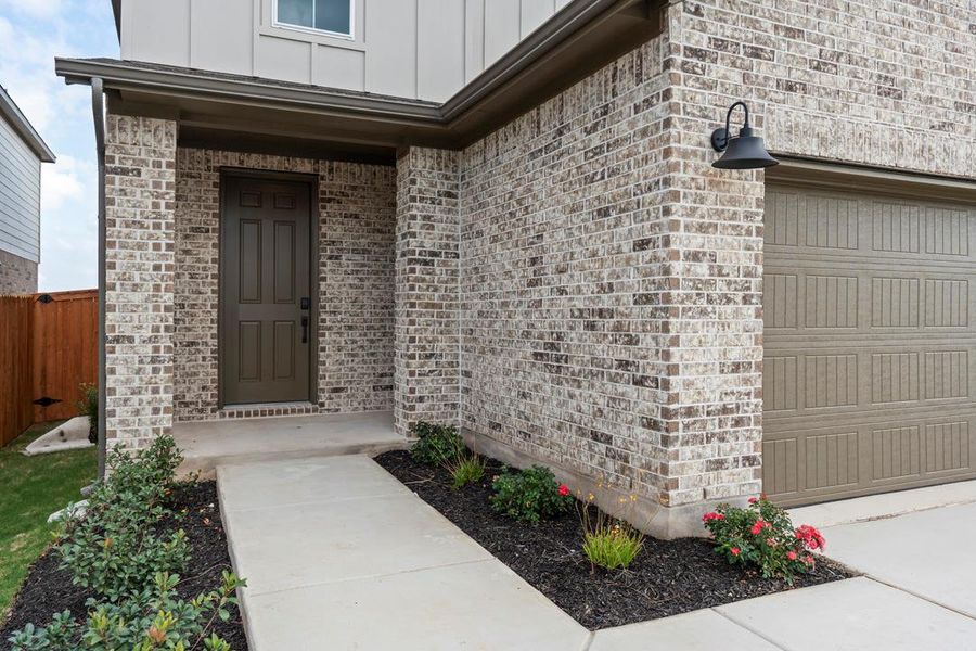 Exterior details and patio area of a home in Lariat, Liberty Hill (Image 3).