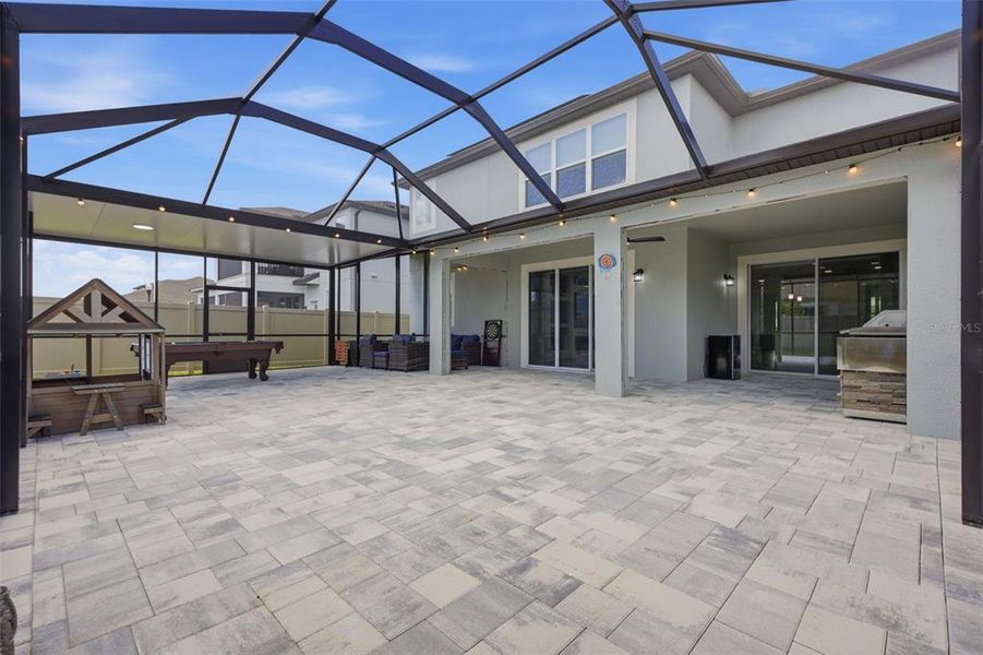 Exterior details and patio area of a home in Whispering Oaks Preserve, Wesley Chapel (Image 4). Exterior details and patio area of a home in Whispering Oaks Preserve, Wesley Chapel (Image 4).