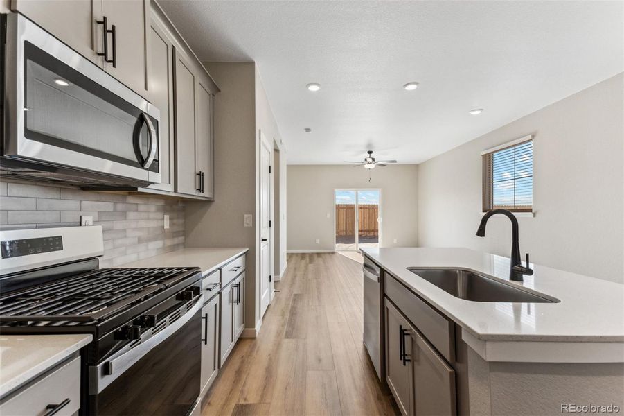 Furnished interior view inside a new home in Second Creek Farm, Commerce City (Image 6).