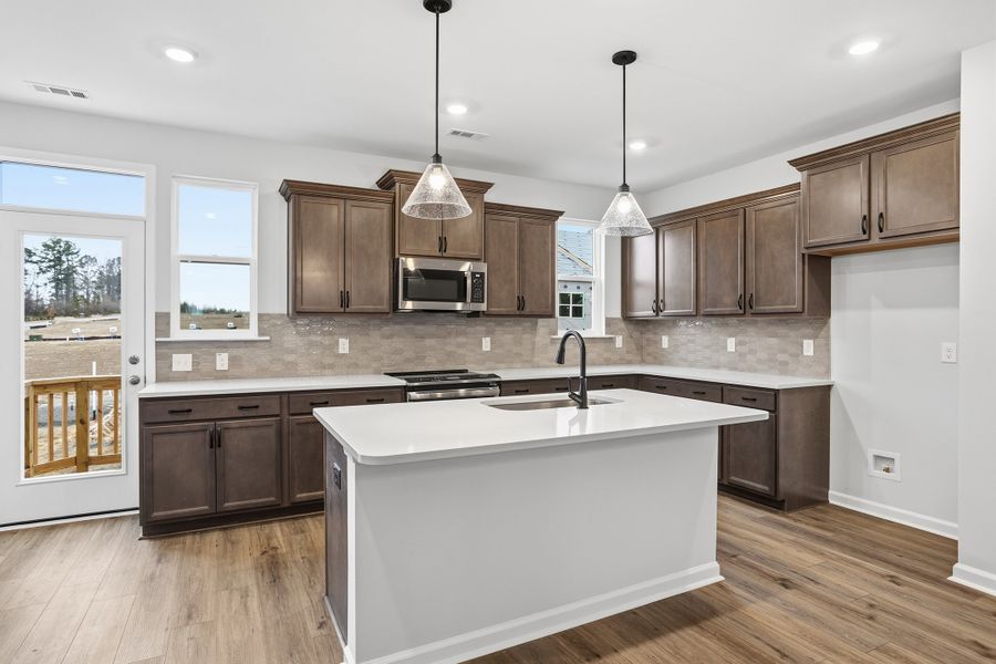 Furnished interior view inside a new home in Renaissance at White Oak, Garner (Image 9).