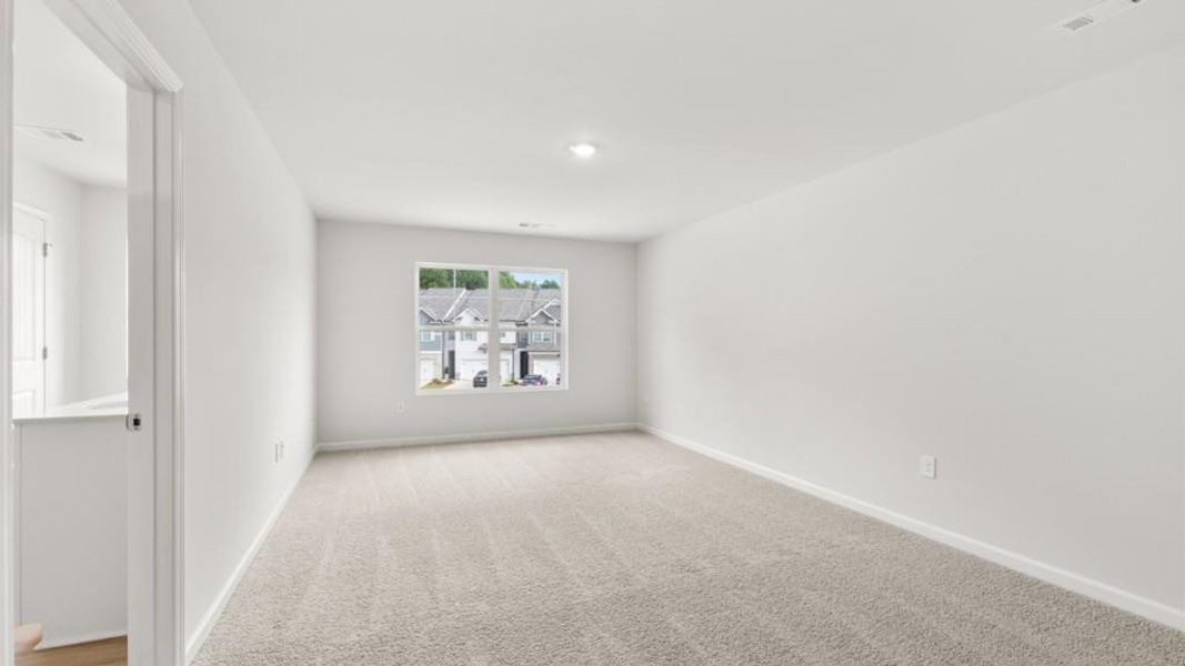 Spacious, unfurnished interior of a new home in Waypoint, Flowery Branch (Image 26).