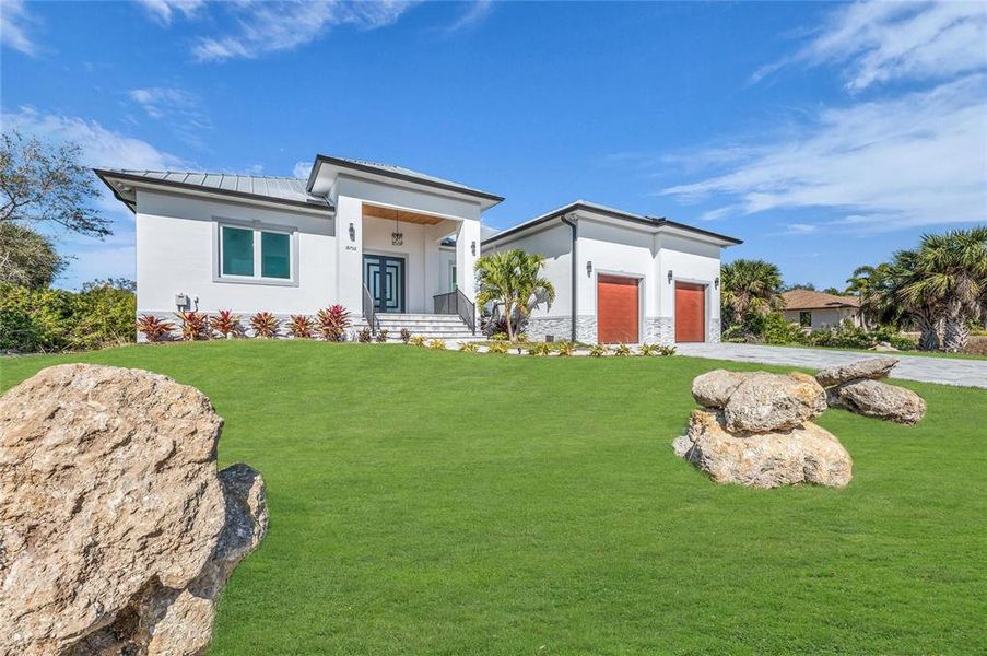 Front exterior of a new home in , Port Charlotte, FL, highlighting curb appeal (Image 26).