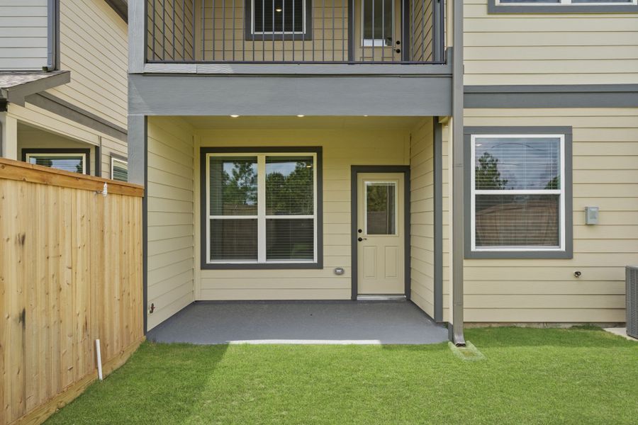 Exterior details and patio area of a home in Bridgeland, Cypress (Image 24).