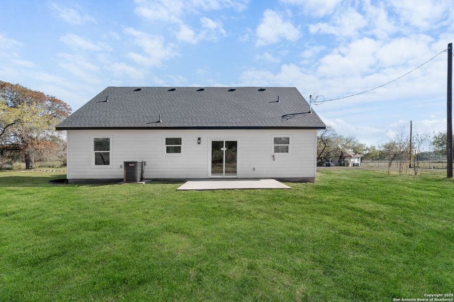 Exterior details and patio area of a home in , Lytle (Image 24).