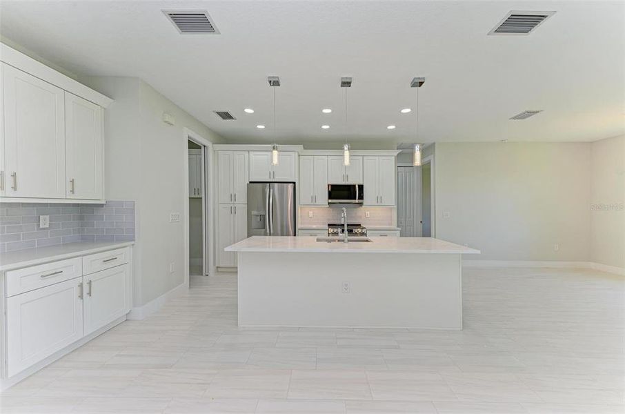 Furnished interior view inside a new home in , North Port (Image 12).