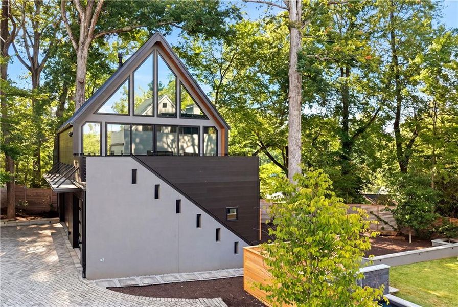 Front exterior of a new home in , Atlanta, GA, highlighting curb appeal (Image 27).