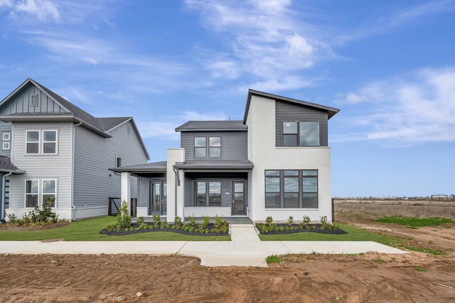 Front exterior of a new home in Indigo - Enclave Collection, Richmond, TX, highlighting curb appeal (Image 24).