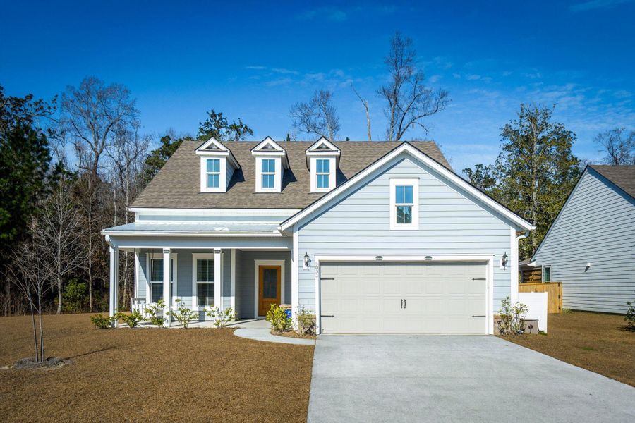 Front exterior of a new home in , Johns Island, SC, highlighting curb appeal (Image 1). Front exterior of a new home in , Johns Island, SC, highlighting curb appeal (Image 1).