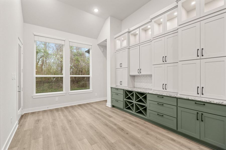 Centric formal dining with butlers pantry