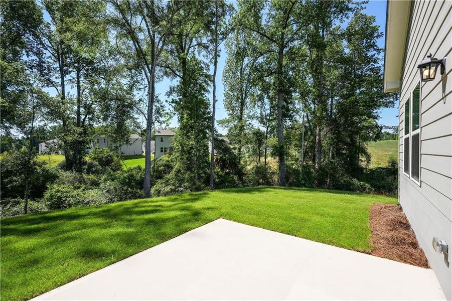 Exterior details and patio area of a home in Crossvine Village, LaGrange (Image 3).
