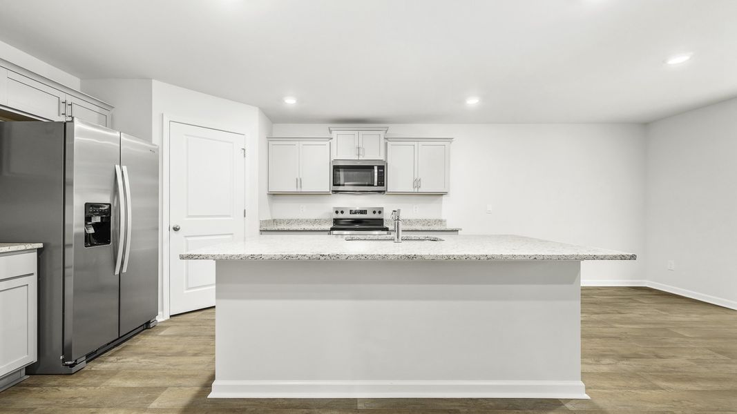 Furnished interior view inside a new home in Greystone North, Stoneville (Image 4).