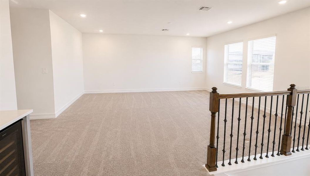 Spacious, unfurnished interior of a new home in Triple Creek: The Executives, Riverview (Image 19).