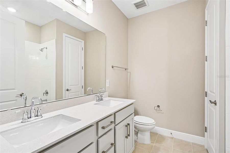 Furnished interior view inside a new home in Legends Preserve - Signature Series, Daytona Beach (Image 17).