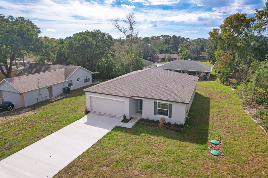 Representative exterior photo of a completed home built from the Oak by Maronda Homes in Coastal Communities, Edgewater, FL (Image 20).