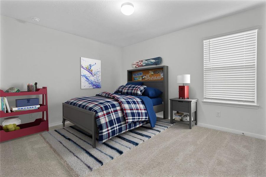 Secondary bedroom features plush carpet, neutral paint, lighting, large window with privacy blinds and ample sized closet space.