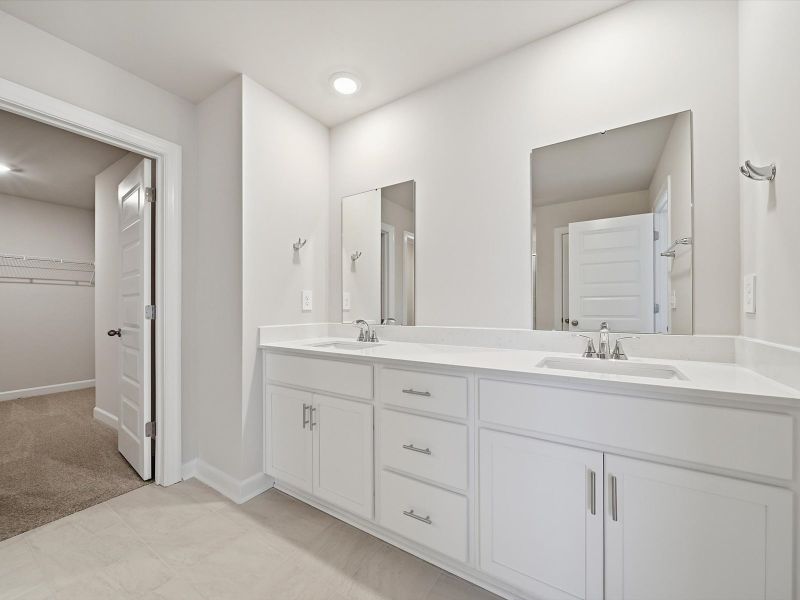 Furnished interior view inside a new home in The Farm at Wells Creek - Signature Collection, Gray Court (Image 6).