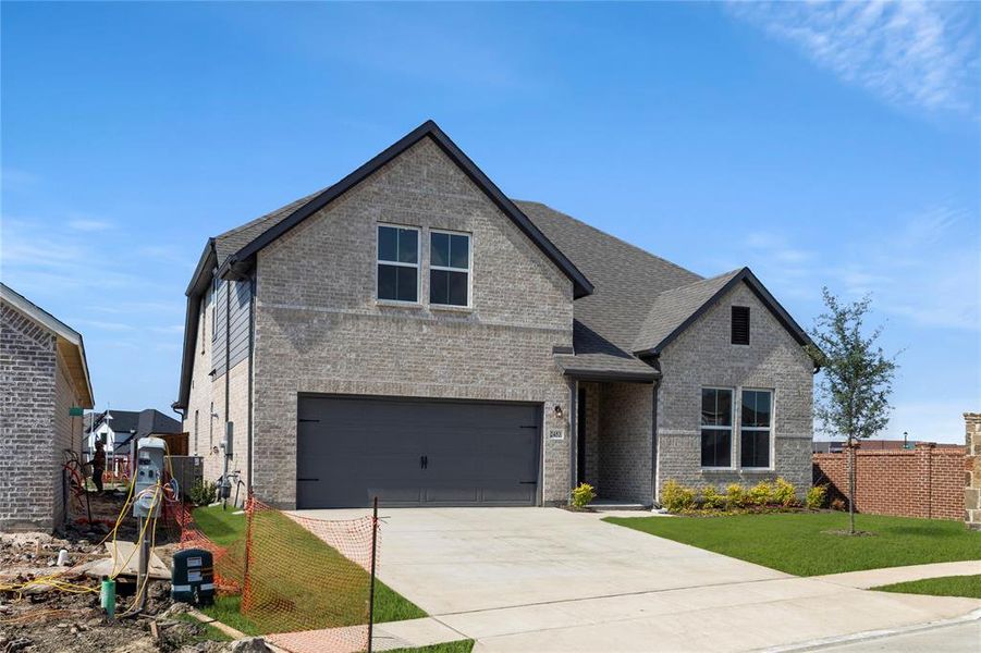 Front exterior of a new home in Creekside, Royse City, TX, highlighting curb appeal (Image 1). Front exterior of a new home in Creekside, Royse City, TX, highlighting curb appeal (Image 1).