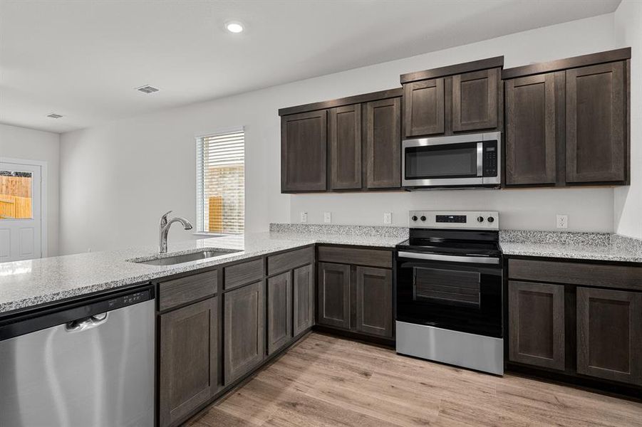 Furnished interior view inside a new home in Edmonds Ranch, Seagoville (Image 4).