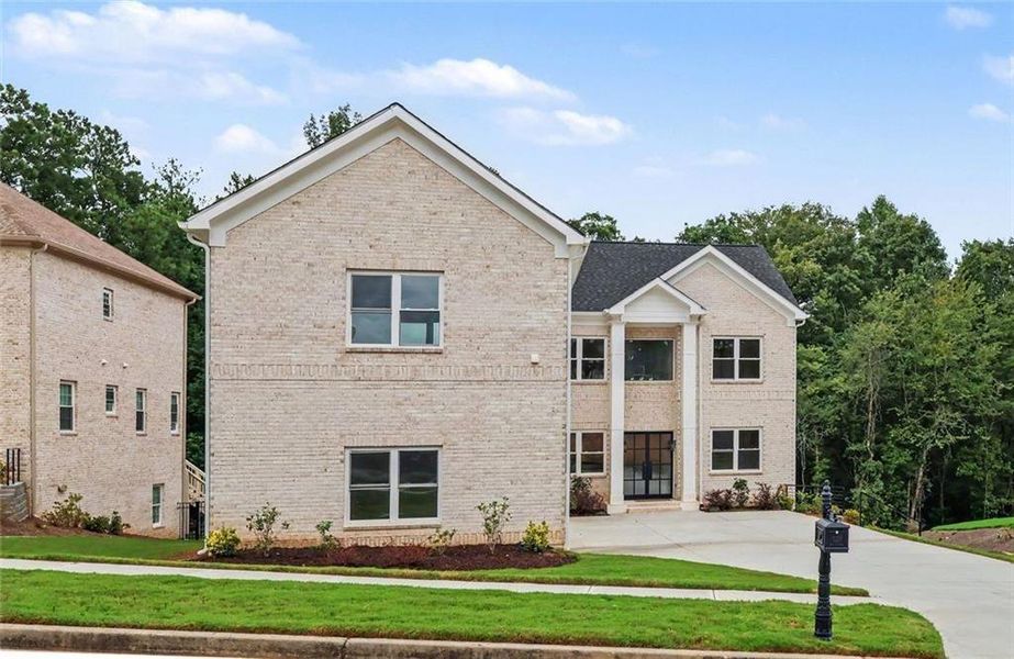 Front exterior of a new home in , Fairburn, GA, highlighting curb appeal (Image 2). Front exterior of a new home in , Fairburn, GA, highlighting curb appeal (Image 2).