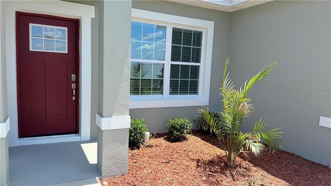 Front exterior of a new home in , Ocala, FL, highlighting curb appeal (Image 1).