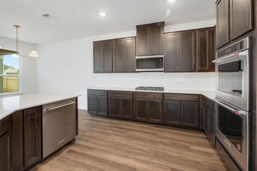 Furnished interior view inside a new home in River Bluff, Leander (Image 5).