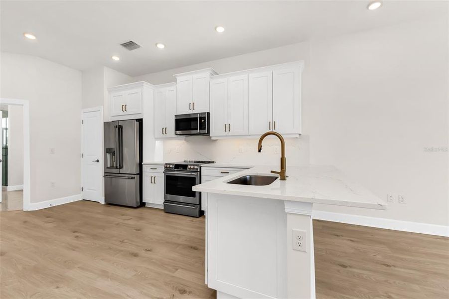 Furnished interior view inside a new home in , Punta Gorda (Image 10).
