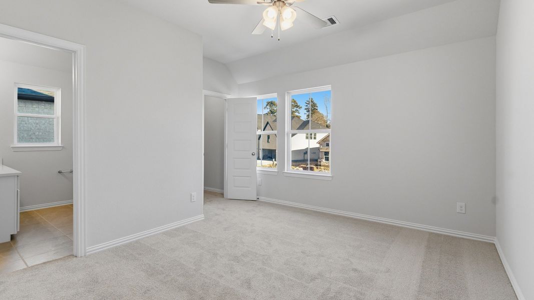 Furnished interior view inside a new home in The Woodlands Hills, Willis (Image 30).