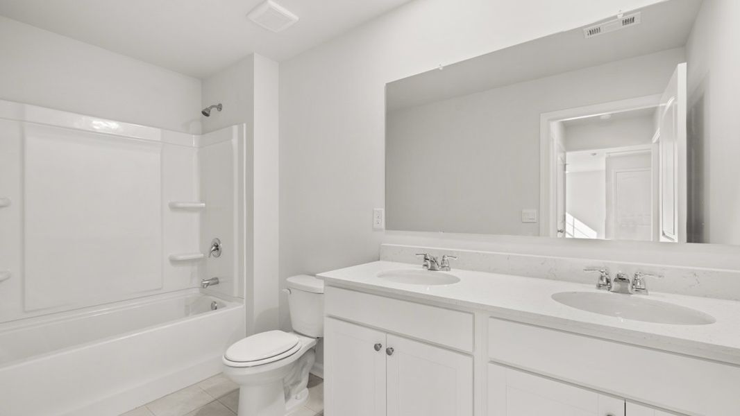 Representative furnished interior of a home built from the Belfort by D.R. Horton in Hamptons at Riverwood North, Dallas (Image 8).