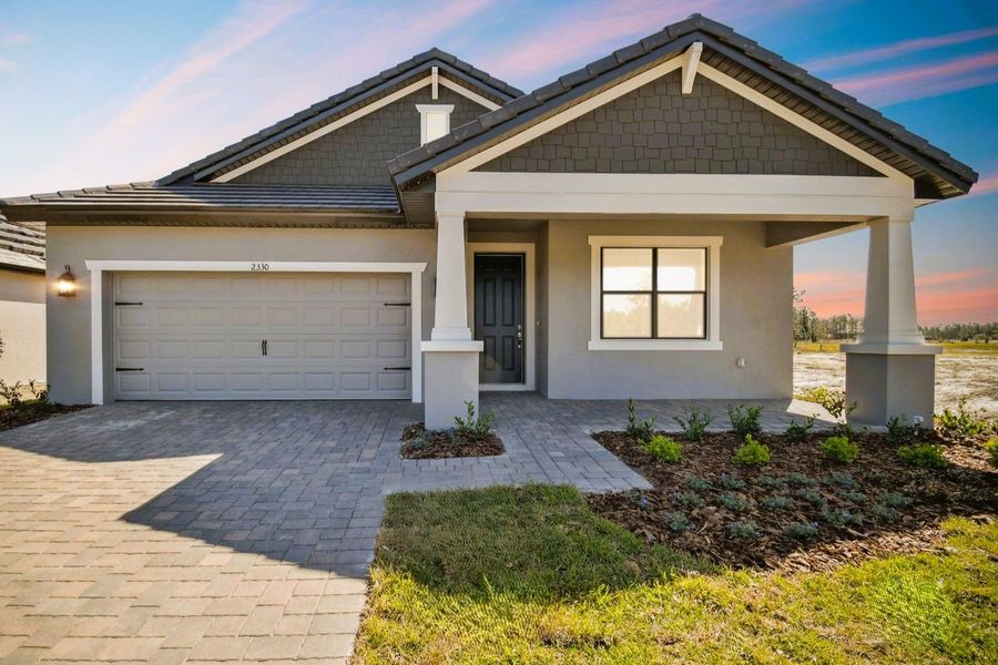 Front exterior of a new home in Southern Hills Plantation, Brooksville, FL, highlighting curb appeal (Image 22).