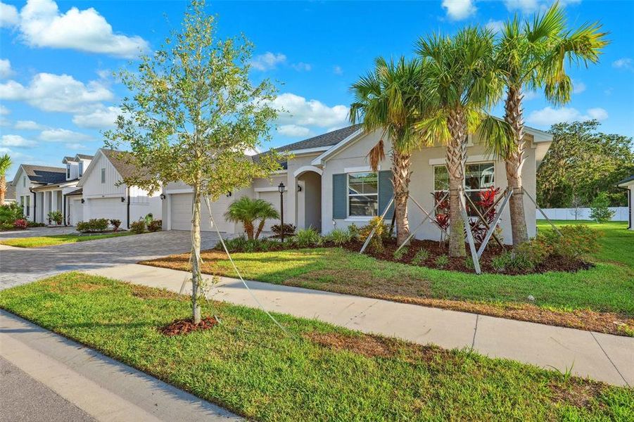 Front exterior of a new home in Copeland Creek, Odessa, FL, highlighting curb appeal (Image 1). Front exterior of a new home in Copeland Creek, Odessa, FL, highlighting curb appeal (Image 1).
