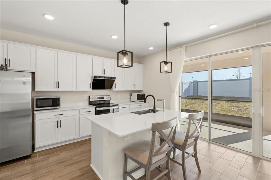 Furnished interior view inside a new home in Seasons at Lakeside Forest, Tavares (Image 16).