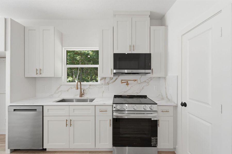 Furnished interior view inside a new home in , Willis (Image 11).