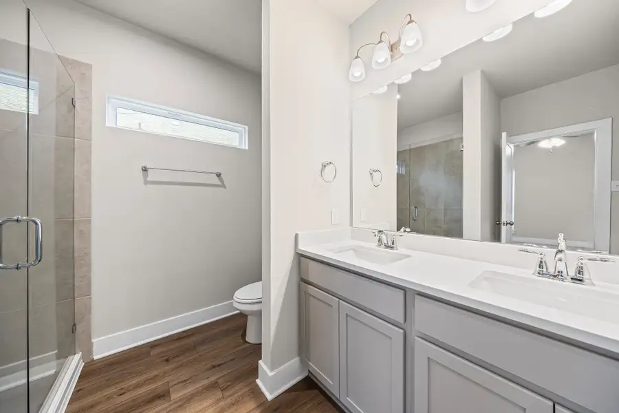 Representative furnished interior of a home built from the Caden by Omega Builders in North Point, Temple (Image 11).