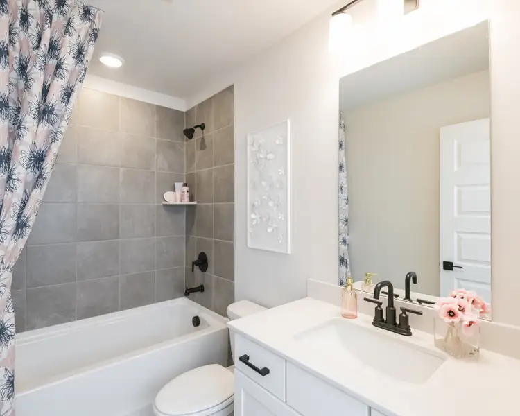 The secondary bedrooms feature a full, spacious bathroom.