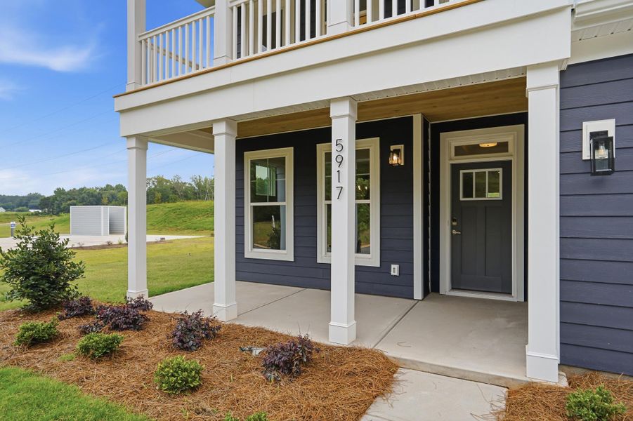 Exterior details and patio area of a home in Enclave at Riverdale, Huntersville (Image 3).