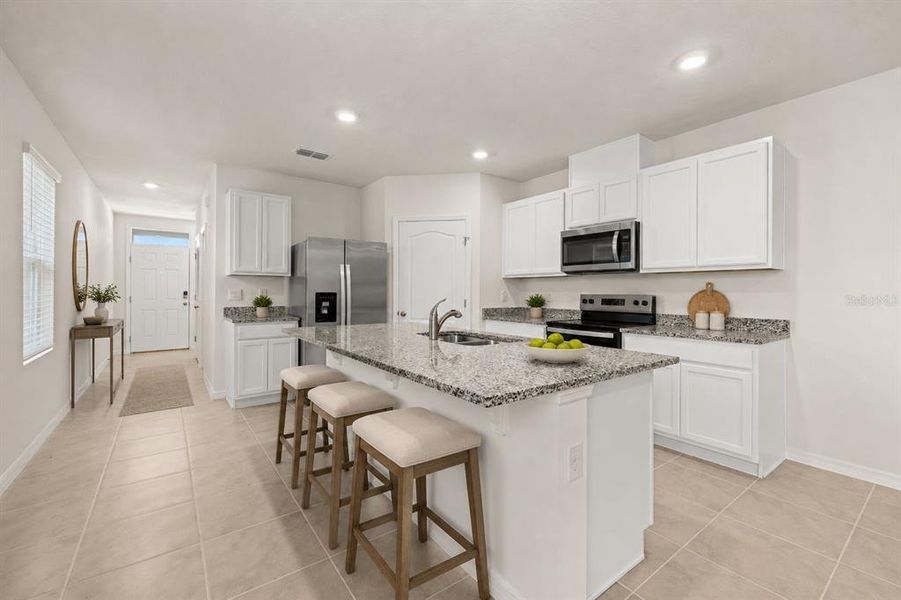 Furnished interior view inside a new home in , Kissimmee (Image 6). Furnished interior view inside a new home in , Kissimmee (Image 6).