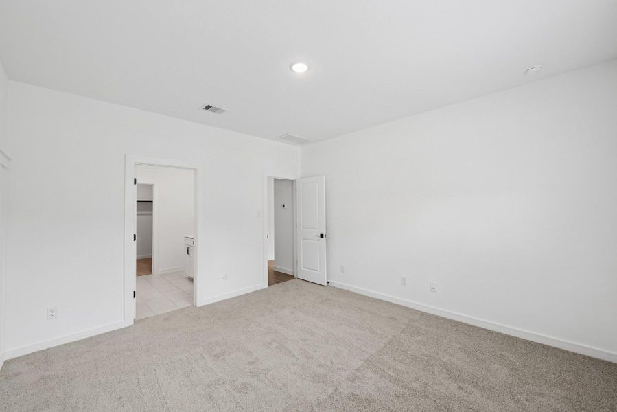 Private primary suite (*Photo not of actual home and used for illustration purposes only.) Private primary suite (*Photo not of actual home and used for illustration purposes only.)