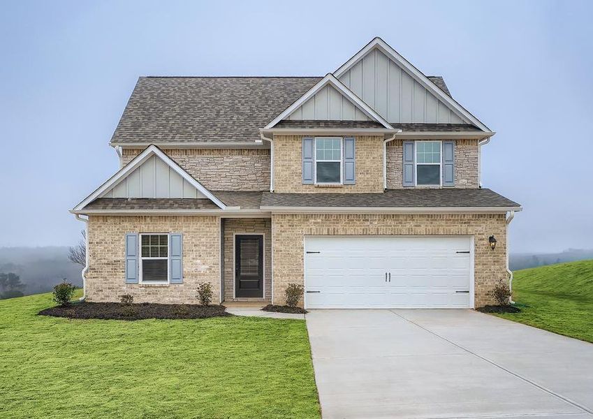 Exterior of the two-story Hartwell, showcasing a stunning selection of stone, brick and siding.