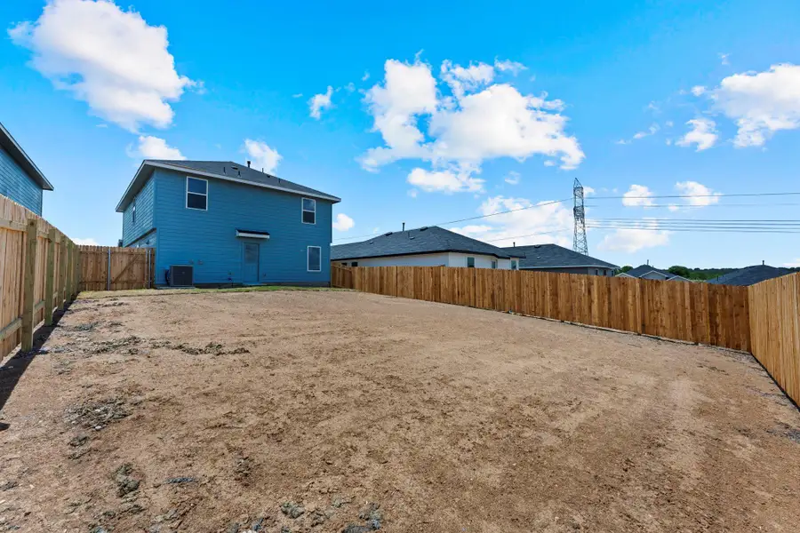 Exterior details and patio area of a home in Avenida, Converse (Image 3).